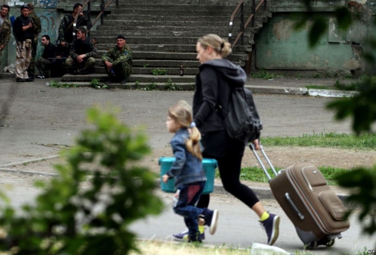 Зображення до:  Половина переселенцев не собирается возвращаться домой — опрос