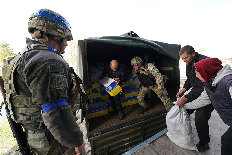 Зображення до:  Окупанти обстріляли Козачу Лопань перед роздачею гуманітарної допомоги — НГУ