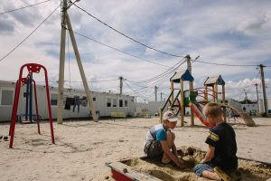 Зображення до посту: Мешканців модульного містечка в Харкові почали переселяти до гуртожитків