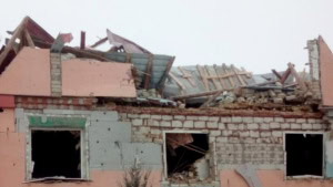 Зображення до посту: Від обстрілів на Харківщині пошкоджені будинки та дорога, постраждала жінка